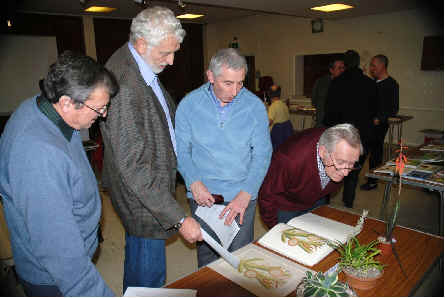 NMK Branch members,Peter, David, Colin and Jack look at the Masson print